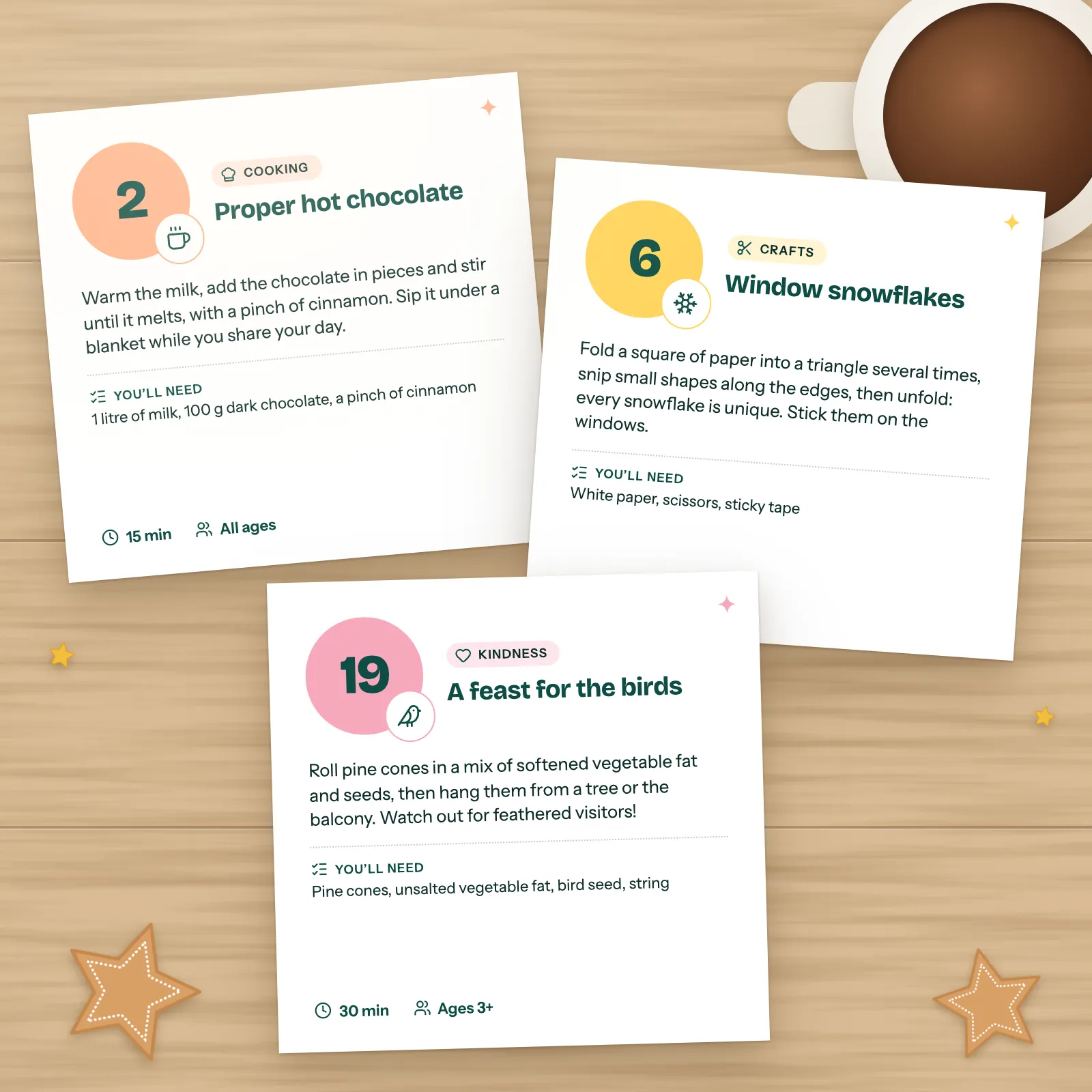 Close-up of three activity cards: day number, activity, materials, time and suggested age