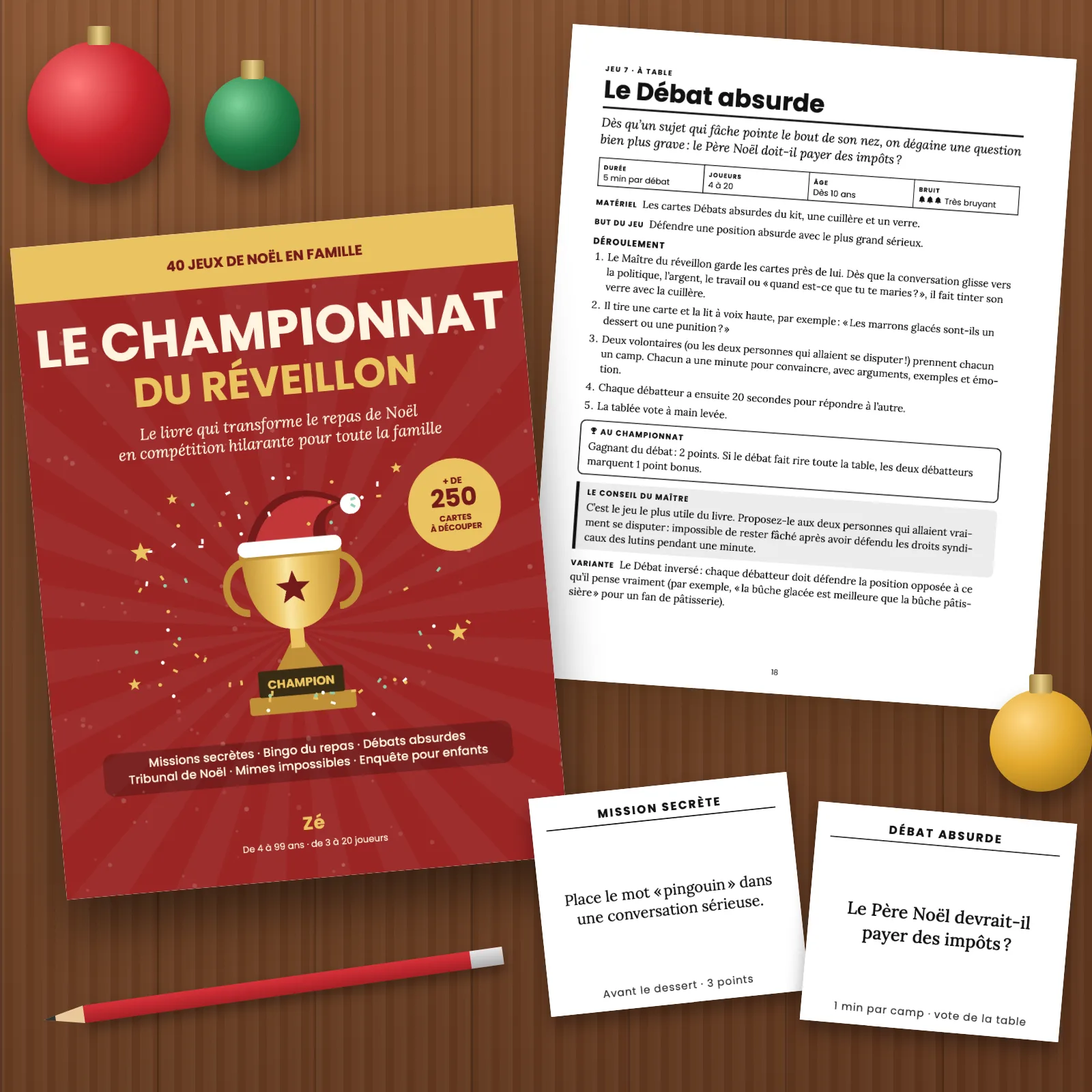 La couverture et des pages imprimées du PDF sur une table en bois : la fiche du jeu 7 « Le Débat absurde », une carte Mission secrète « Place le mot pingouin dans une conversation sérieuse » et une carte Débat absurde « Le Père Noël devrait-il payer des impôts ? », avec des boules de Noël et un crayon