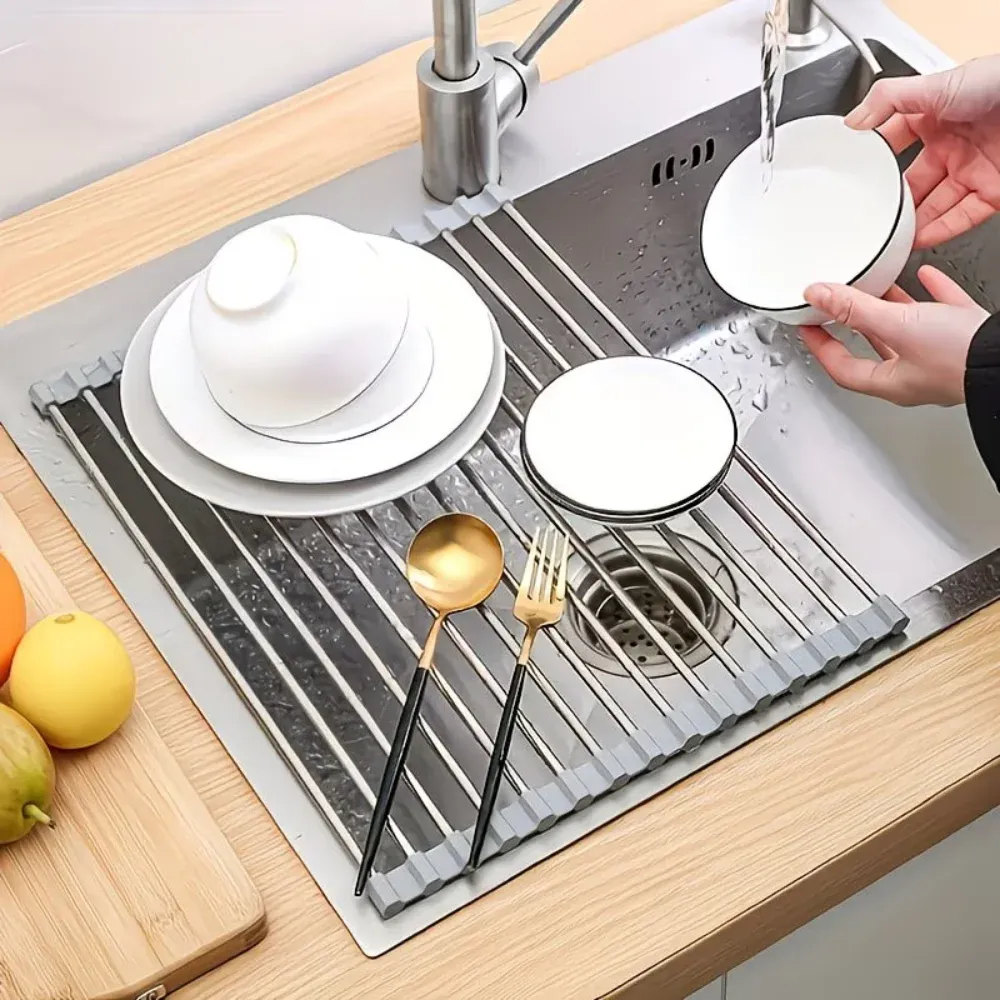 Roll-up rack over the sink with dishes drying