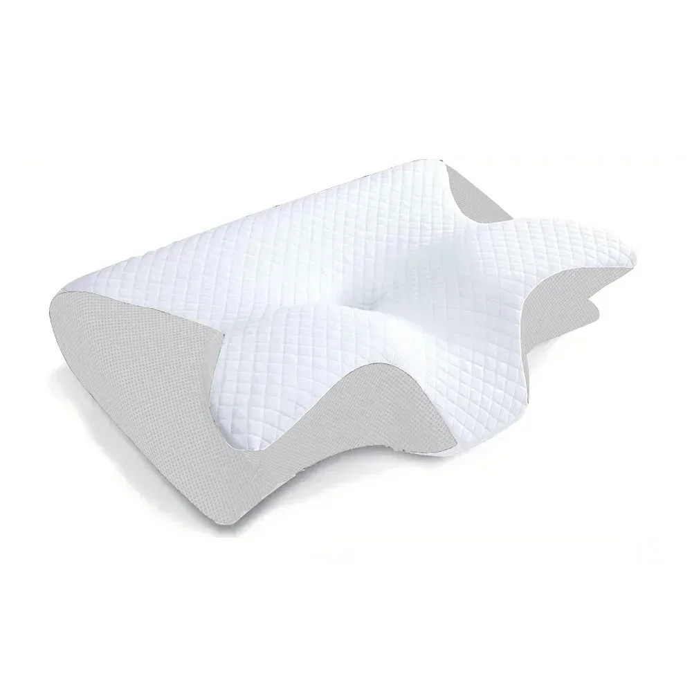 Oreiller papillon blanc vu de profil, avec ses creux latéraux et son creux central