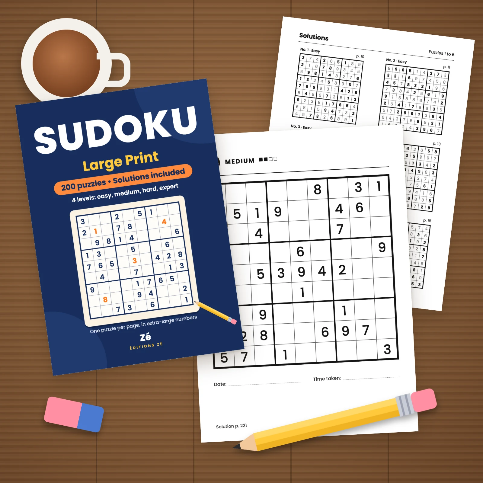 Three printed A4 sheets on a wooden table: the cover, puzzle no. 51 (Medium level) and a solutions page, with a cup, an eraser and a pencil